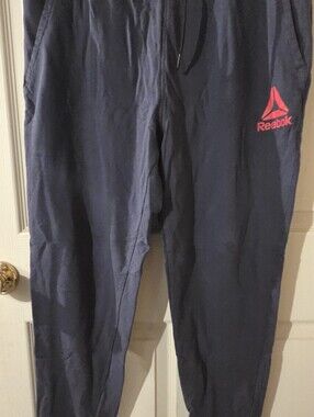 Reebok Navy Jogger Sweatpants with Pink Logo Accent